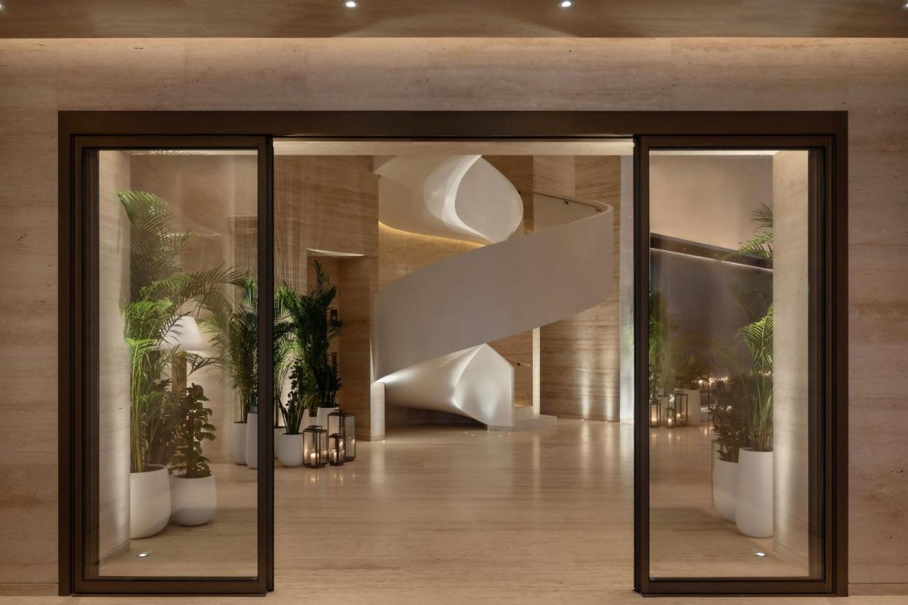 The Dubai Edition Bagian luar foto The lobby of the hotel