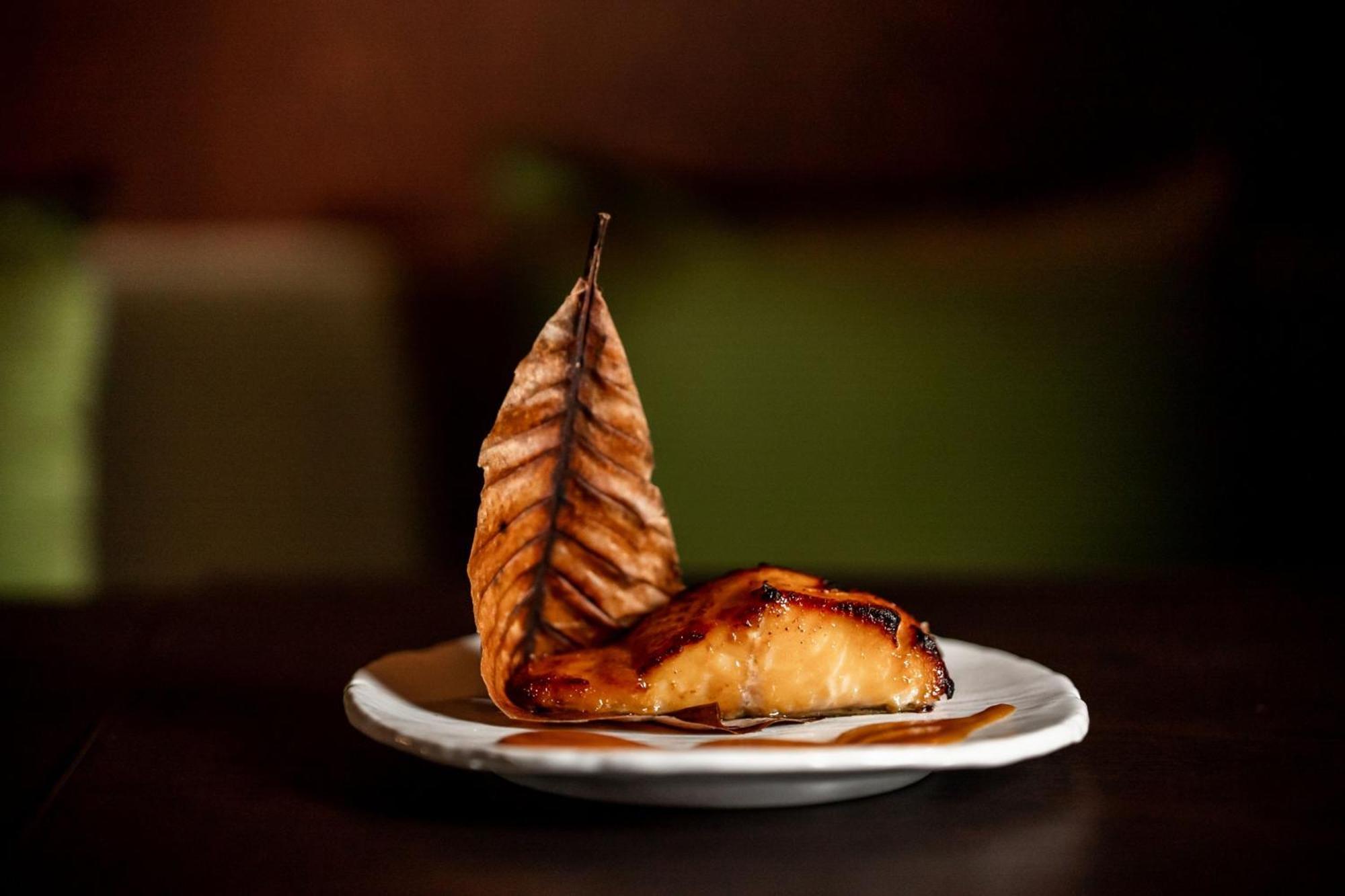 The Dubai Edition Bagian luar foto Smoked and grilled salmon